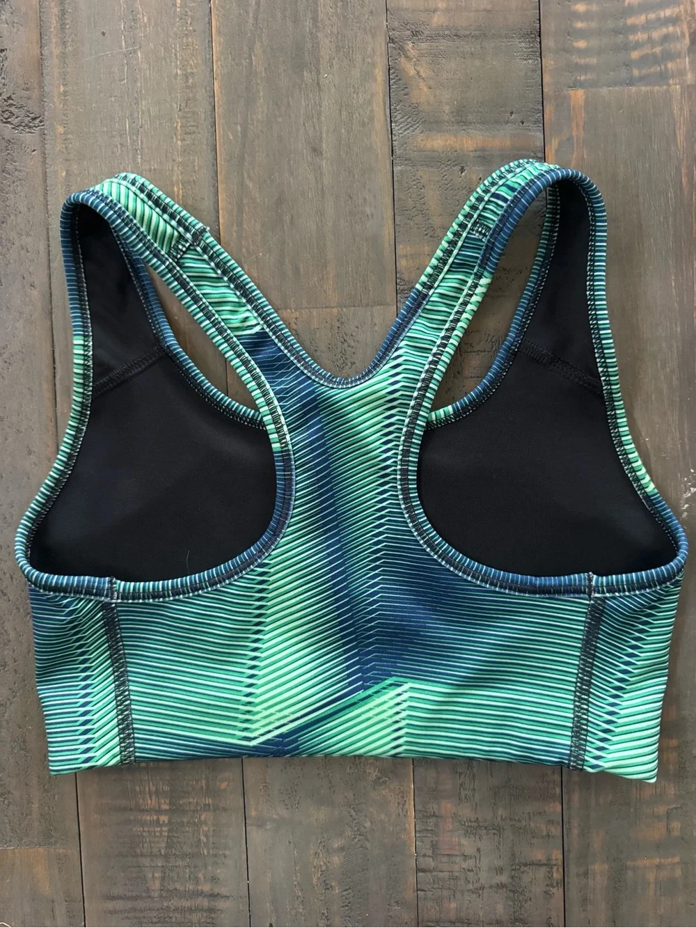 Nike Women’s green & navy Striped Sports Bra